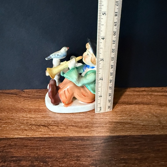 Figurine of Boy Playing Horn - Picture 9 of 12